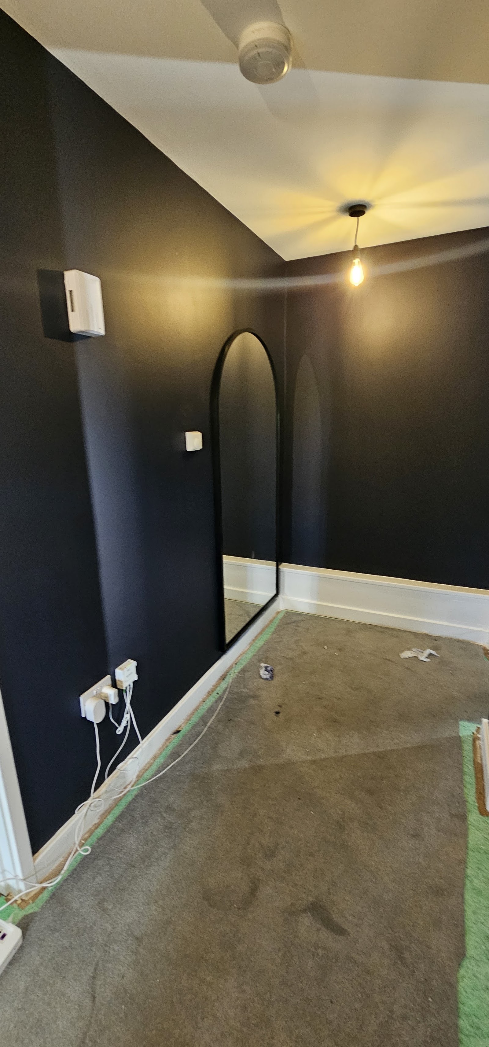 Navy feature wall by H&C Cleaning and Maintenance in Hailsham
