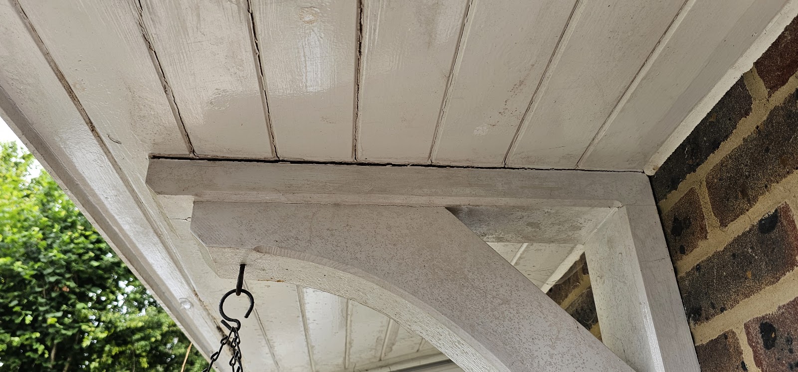 Porch timberwork painted white by H&C Cleaning and Maintenance in Hailsham