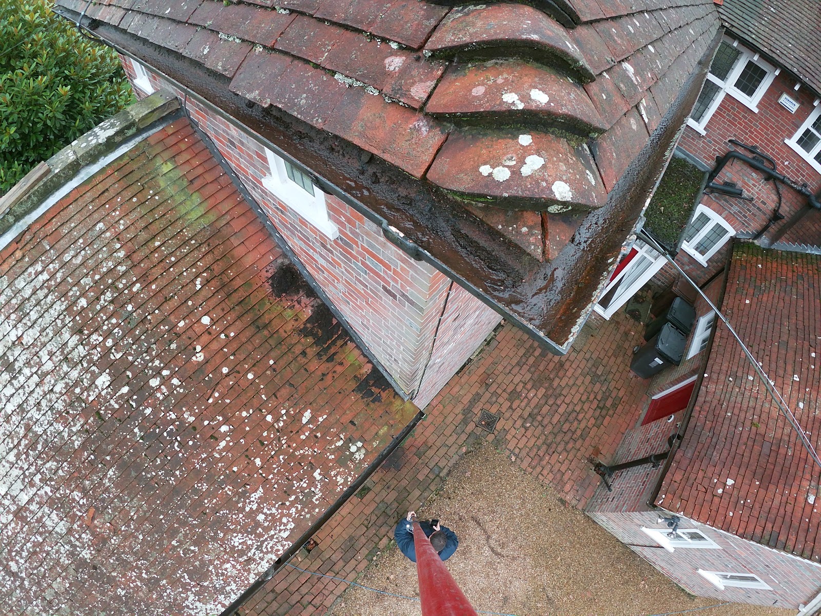 Gutter clearing over conservatory by H&C Cleaning and Maintenance in Hailsham