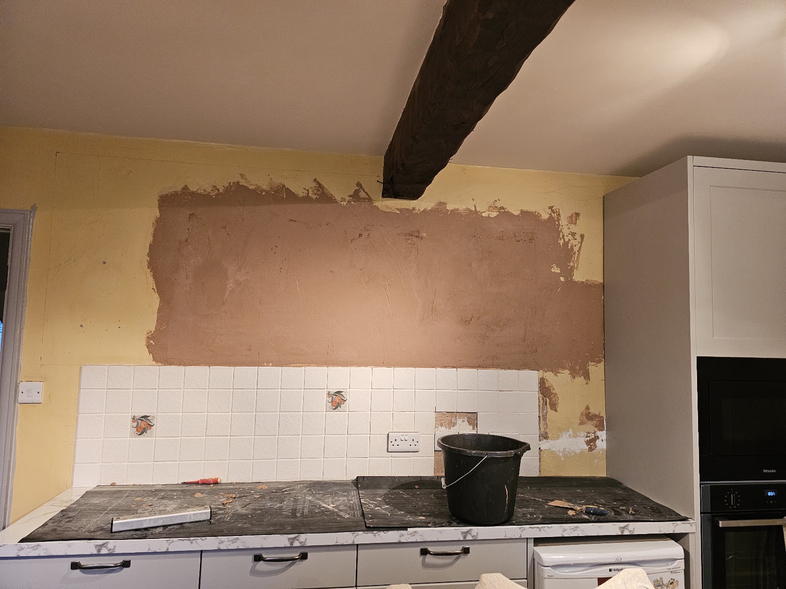 Kitchen wall preparation by H&C Cleaning and Maintenance in Hailsham