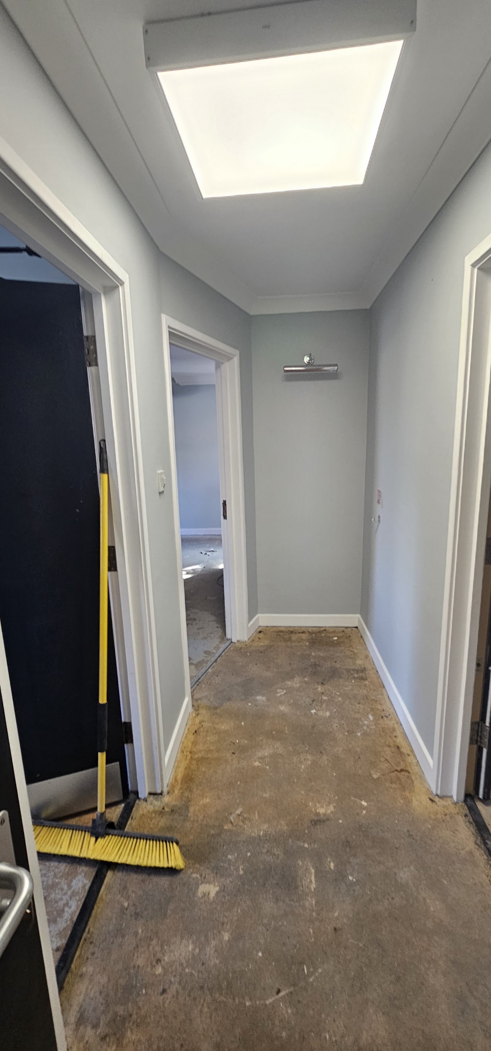 Narrow hallway refresh by H&C Cleaning and Maintenance in Hailsham