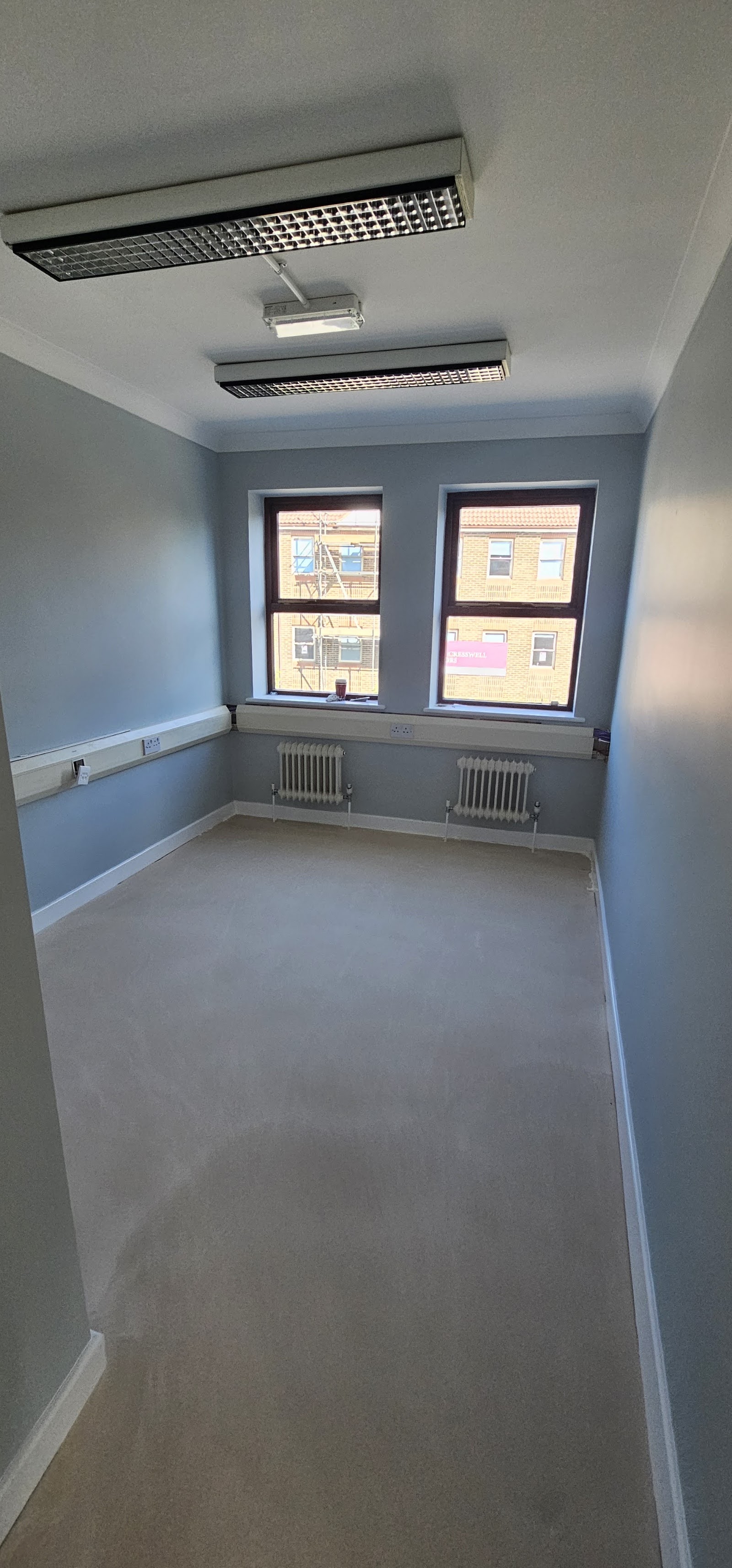 Fresh grey corridor by H&C Cleaning and Maintenance in Hailsham
