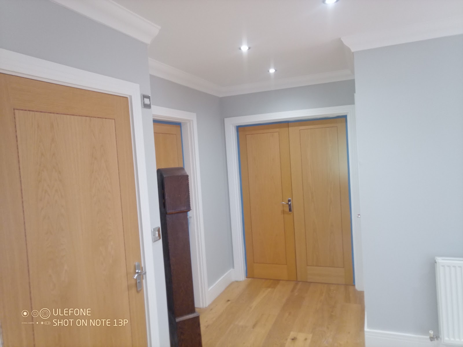 Hallway with oak doors by H&C Cleaning and Maintenance in Hailsham